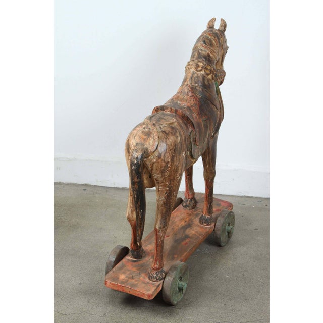 Pair of Monumental Indian Polychrome Carved Wood Horses on Wheels, 19th C. For Sale - Image 15 of 17