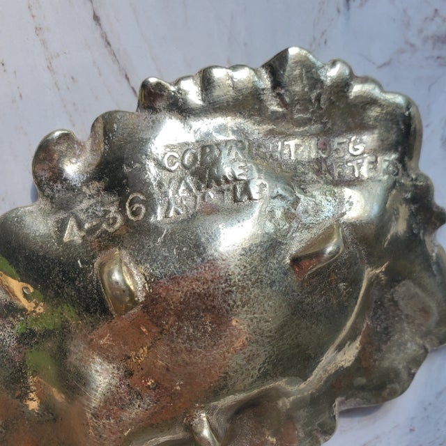 Lovely vintage mistletoe catchall in heavy brass. Embossed on the underside with VA Metal Crafters 1956. Beautiful as an...