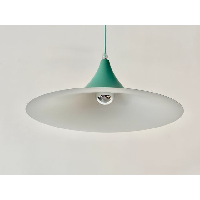 Designed in 1968 by danish architects claus bonderup and torsten thorup, the iconic semi pendant is one of the most...