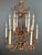 This magnificent 2-tier chandelier with 12 lights is made of gilded metal. It is a French work in the style of Maison...