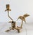 Vintage 1990s brass floral and hummingbird candle holder featuring a sculpted bird and rosebud candle sockets. No makers...