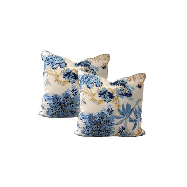 Elevate your space with this stunning pair of throw pillows featuring a bold Thibaut fabric Chinoiserie-inspired print in...