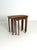 Danish Teak Nesting Tables, 1960s Elegant set of three Danish nesting tables crafted from beautifully aged teak during the...