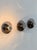 Set of three metal wall lights, made in France in the 1970s. Original design offering interesting plays of light and a...