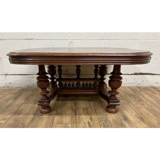 This is a gorgeous antique French Henry II Renaissance walnut center table, coffee table, or cocktail table. Features a...