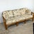 A beautiful and substantial vintage rattan sofa from the 1970s–80s — the anchor piece of a coordinated coastal living room...