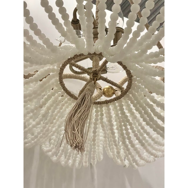 Stylish Ro Sham Beaux Fiona Chandelier. Rope wraped frame, gold accents, with beaded crystals. Decorative rope details....