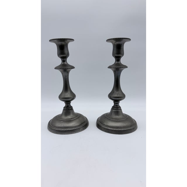 Antique Pair of American Pewter Candlesticks with Push Up Rods, Circa 1820s–1830s A handsome and authentically American...