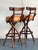 Elevate your kitchen island or home bar with this exceptional pair of vintage bar stools, showcasing the artful design of...
