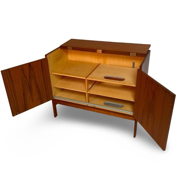 Vintage stereo display cabinet made by HG Furniture in Denmark. The piece allows you to have multiple pieces of Hifi...