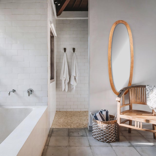 At almost 40 inches high, this mirror is made for the open concept space. In a warm burnished brass finish, it adds a...