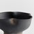 This footed bowl is hand thrown and formed by an artisan, s touch. But the real story is in the glaze. The dynamic texture...