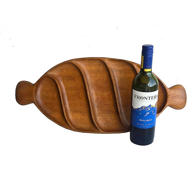 Offered is a vintage Taverneau wood tray designed by Arthur Umanoff for Pantalcraft in the 1960s and made in Haiti. The...