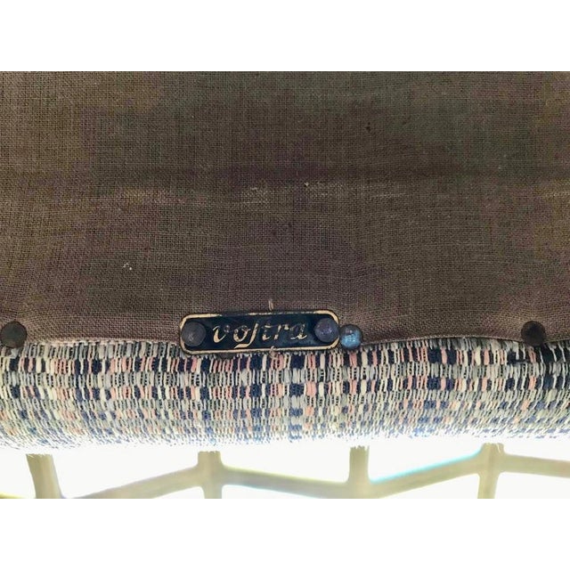 This Vostra 602 easy chair was designed by Jens Risom for Knoll Assoc. Inc. in the early 1950s and was manufactured by...