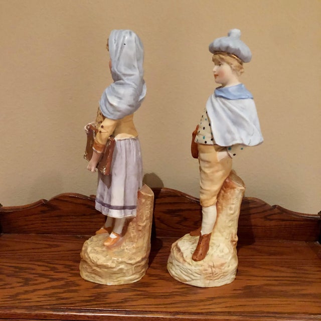Traditional Pair of Early 20th Century German Bisque Figurines of Schoolchildren For Sale - Image 3 of 9