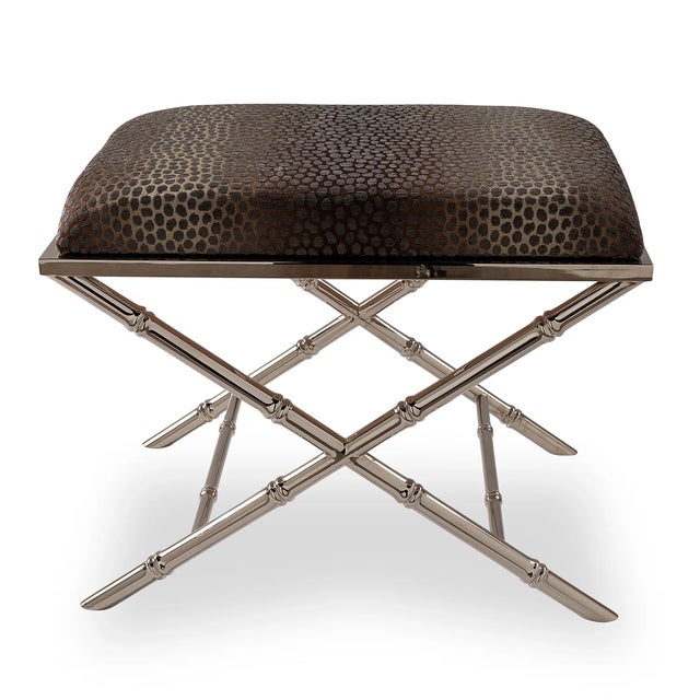 Classic detail of bamboo is featured on the Lauderdale upholstered bench. Cast steel metal frames are available in aged...