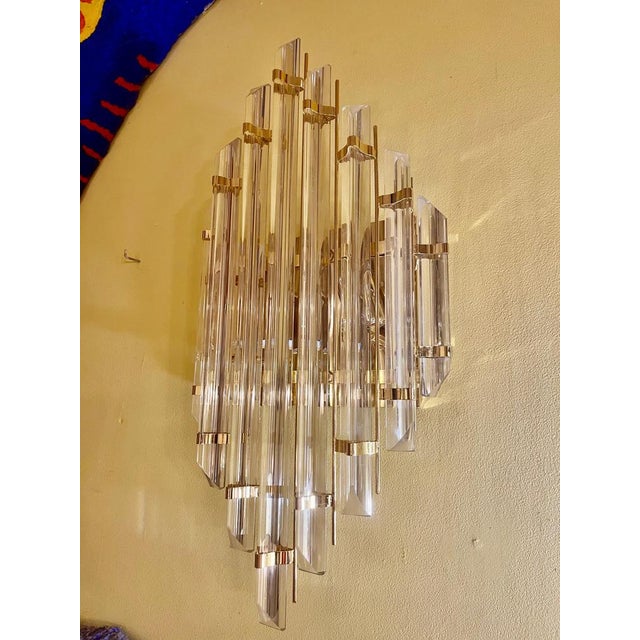 Venini wall lamp in Murano glass with iridium glass. The design and the quality of the glass make this piece the best in...