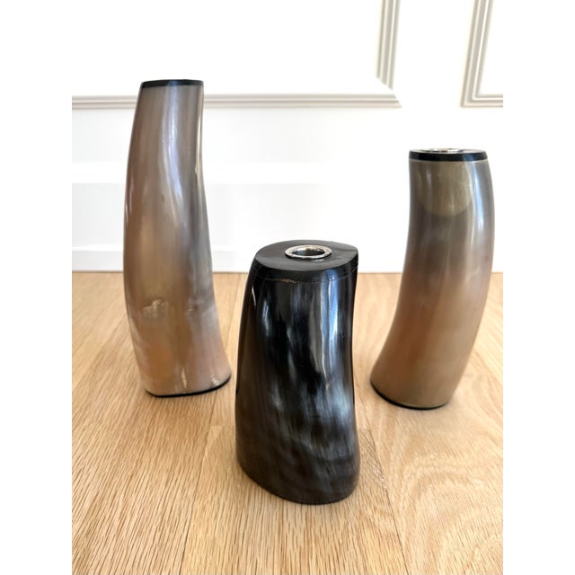Sculptural set of three vintage polished horn candlesticks in the style of Karl Springer. Organic modern forms crafted...