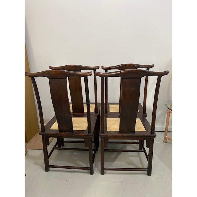 Beautiiful classic dark Elmwood high Yoke back dining chairs, more commonly recognized as Official's Hat Chairs. They are...