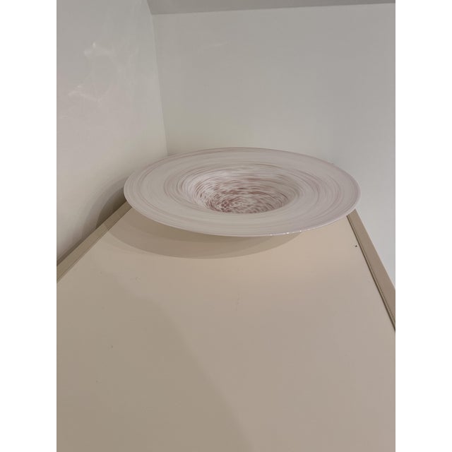 Gorgeous shallow bowl that will be the show stopper on any tabletop. In a delicate shell pink with slightly deeper swirls,...