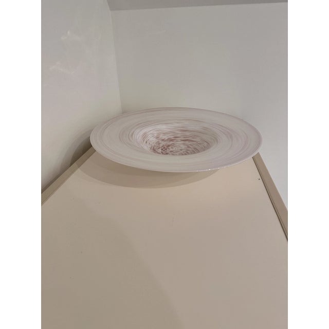 Gorgeous shallow bowl that will be the show stopper on any tabletop. In a delicate shell pink with slightly deeper swirls,...