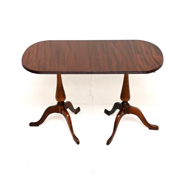 A lovely antique Regency style coffee table. This was made in England, it dates from around the 1920’s. This is of lovely...