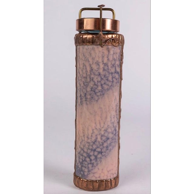 Rare 1980's Windseye Studio glass and copper framed kaleidoscope, ovoid form encased in beautifully colored mottled slag...