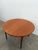 Authentic vintage mid century modern teak extendable dining table with 1 built-in leaf. By Nathan Furniture. Maker's label...