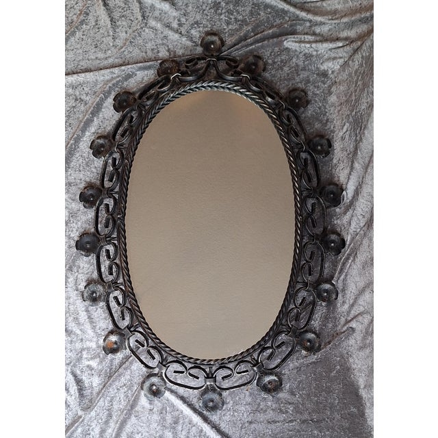 Vintage Rustic Oval Wall Mirror in Wrought Iron, 1970s, in Very Good conditions. Designed 1970 to 1979