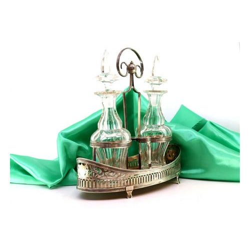 Cruet with Silver Structure and Cruets in Cut Glass, Set of 3, in Very Good conditions. Designed before 1890 This piece...