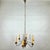 Bring a touch of iconic glamour into your home with this exquisite vintage palm chandelier from the renowned s.a....