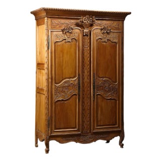 Mid 20th Century French Provincial Carved Walnut Armoire For Sale