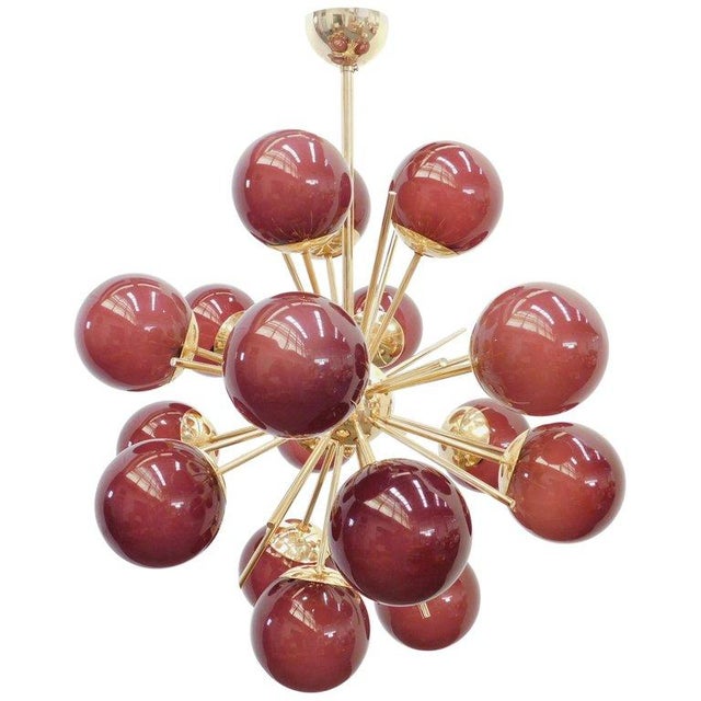 Italian sputnik chandelier with 18 frosted amethyst Murano glass globes mounted on brass frame in lacquered polished brass...