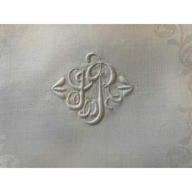 A set of 6 large monogrammed linen napkins, starched, pressed and ready to serve.