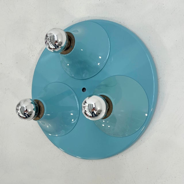 Three-Lights Blue Wall Lamp in Metal, 1980s, in Good conditions. Designed 1980 to 1989 Up to 250V (Europe/UK Standard).The...