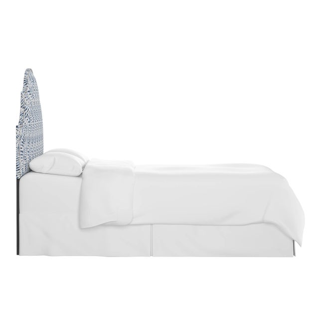 Classic curves wrapped in smooth upholstery, then accented with elegant ornamental nailheads, gives this Upholstered...