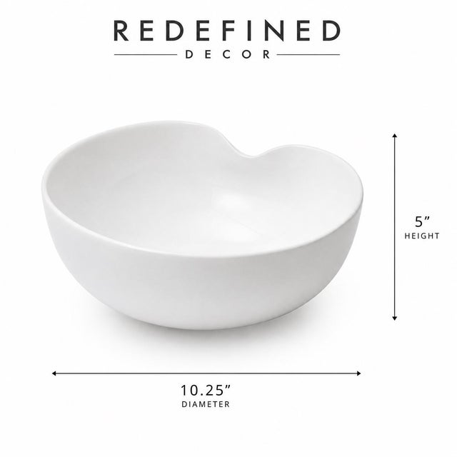 The Thumbprint design is one of Elsa Peretti’s most famous creations ￼ for Tiffany & Co., and this large white bone china...