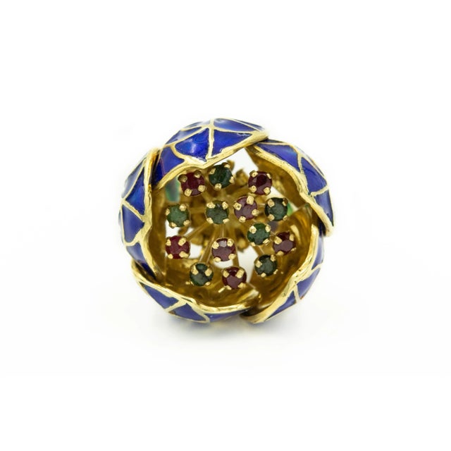 This fantastic set was made between 1950s - 1960s. The plique-à-jour enamel, emerald and ruby en tremblant flower brooch...