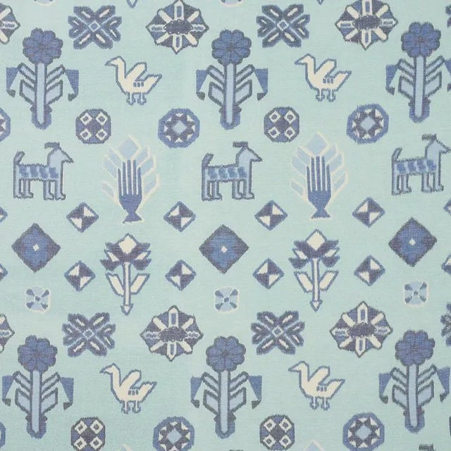 Figurative horses, birds, and flowers mingle across this happy pattern-a true warp print in an ikat style that's charming,...