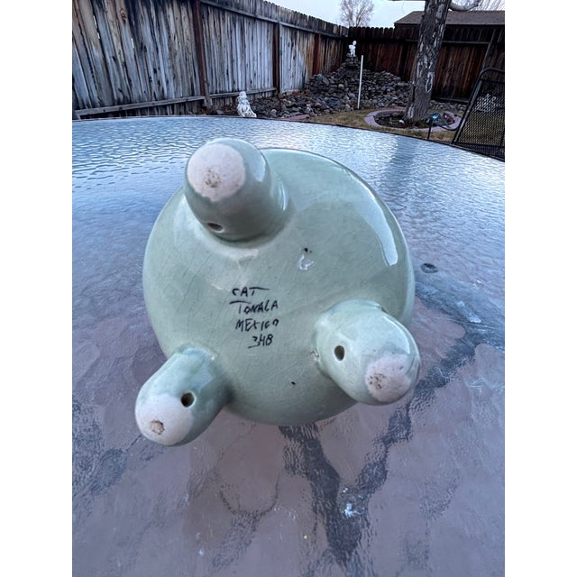 Tonala Pot marked Tonala Cat, means Ceramica Artistica Tonala. It would be perfect for salt or salsa to use with your fun...