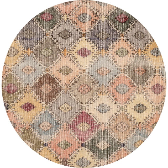 Beautiful Vintage Turkish rug, hand-knotted wool with a multi-color field in a gorgeous all-over geometric tribal design....