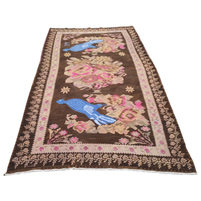 Hand-knotted with care using traditional rug making techniques, this wool rug blends timeless craftsmanship with a modern...