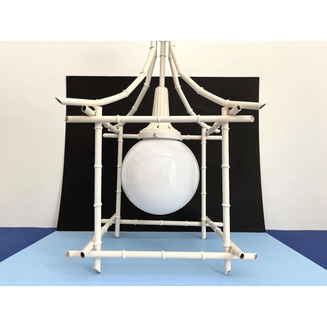 Big Italian bamboo-style pagoda pendant light from the 1960s in its original bone white finish with sculptural open...