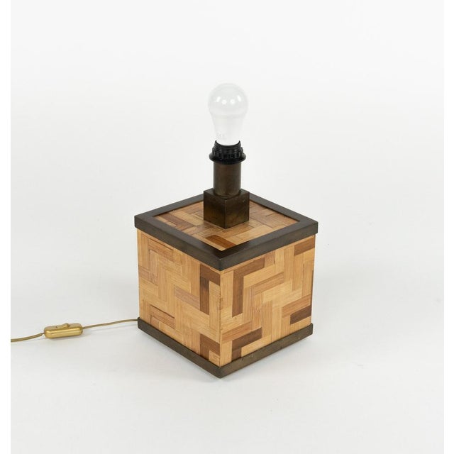 Midcentury beautiful square table lamp in bamboo and brass attributed to Tommaso Barbi. Made in Italy in the 1970s. Up to...