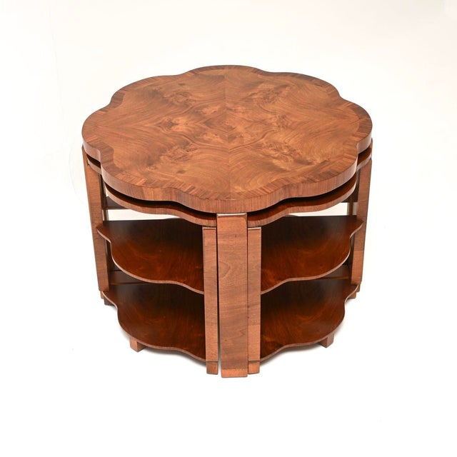 A fantastic Art Deco burr walnut nesting coffee table. This was made in England by Harry and Lou Epstein, it dates from...