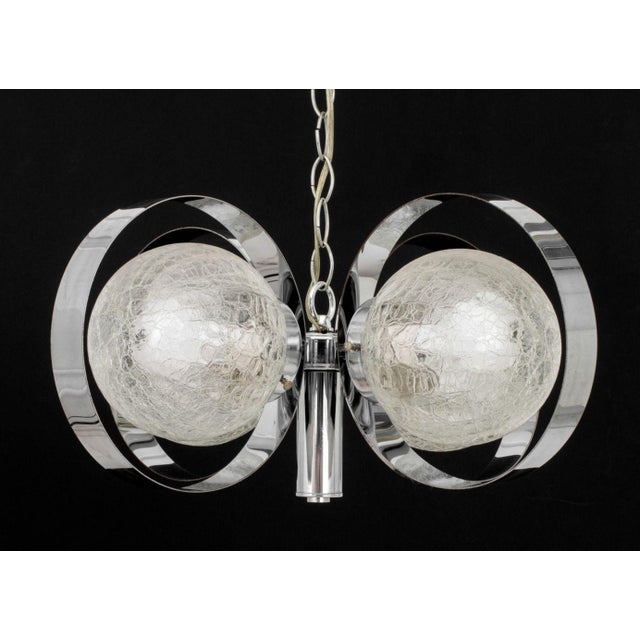 Italian Modern Chrome Ring Chandelier, four crackle glass globe lights, affixed to a central shaft, circa 1970s. 17" H x...