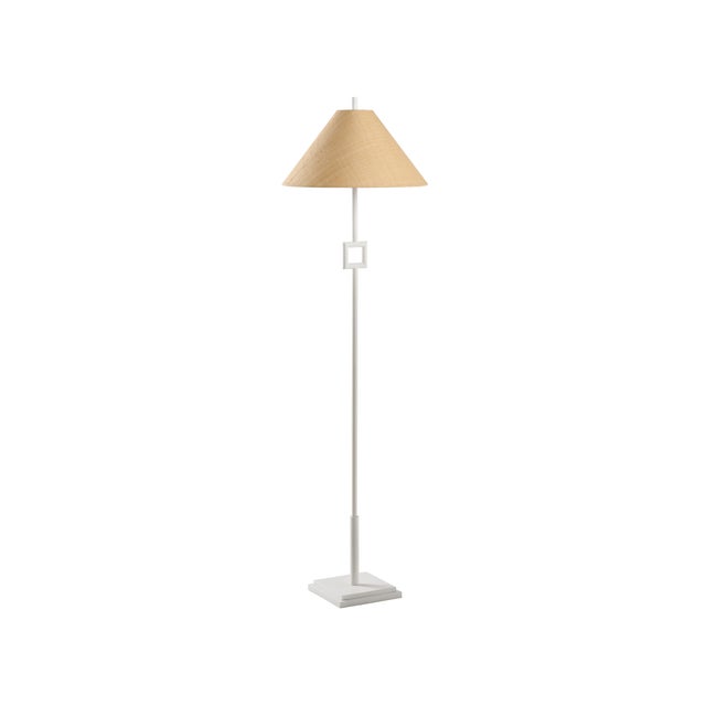This sleek metal floor lamp features a modern silhouette with a bold square accent, adding a touch of architectural...