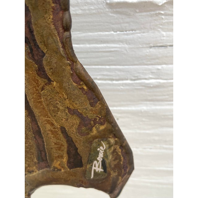 A striking signed metal wall sculpture by William Bowie, beautifully crafted in an organic tree form. The intricately...