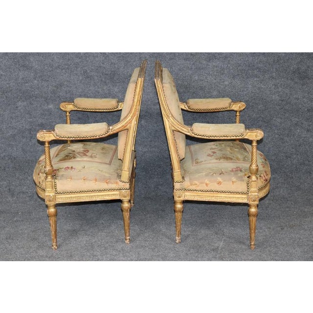 This exquisite pair of late 19th-century French Louis XVI-style armchairs represents the elegance, refinement, and...