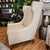 Custom wingback chair in light beige Coraggio Italian leather, made by CBS Furniture in the US- Los Angeles, CA. The back...